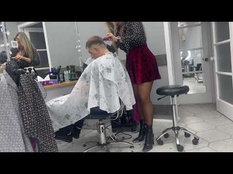 Beautiful Barberette Giving Haircut
